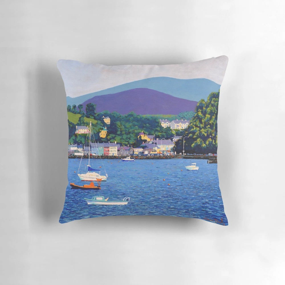 Serene view of Bantry Bay in County Cork, Ireland with mountains, water, and boats in the harbor