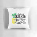 Pineapple-themed throw pillow with a humorous "Not a Swinger, I Just Like Pineapples" quote