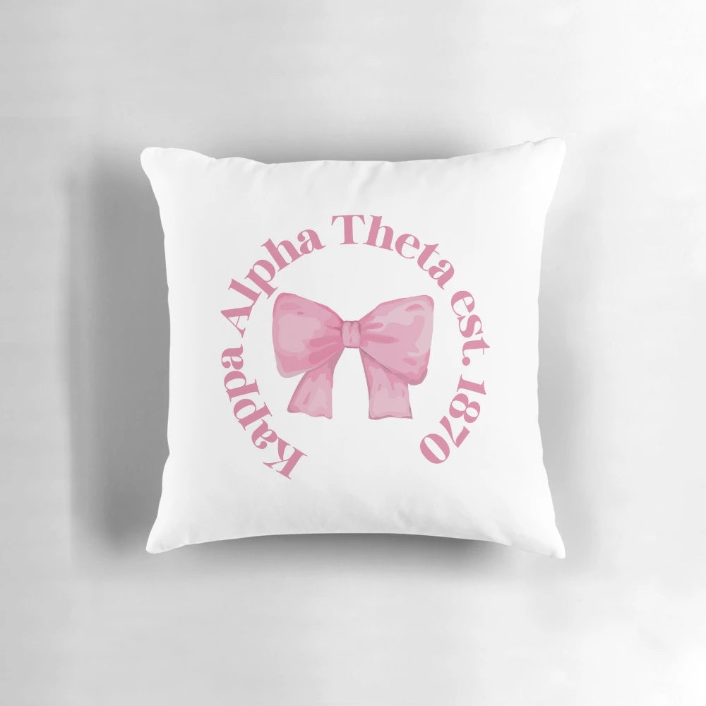 Kappa Alpha Theta sorority pillow with pink bow design