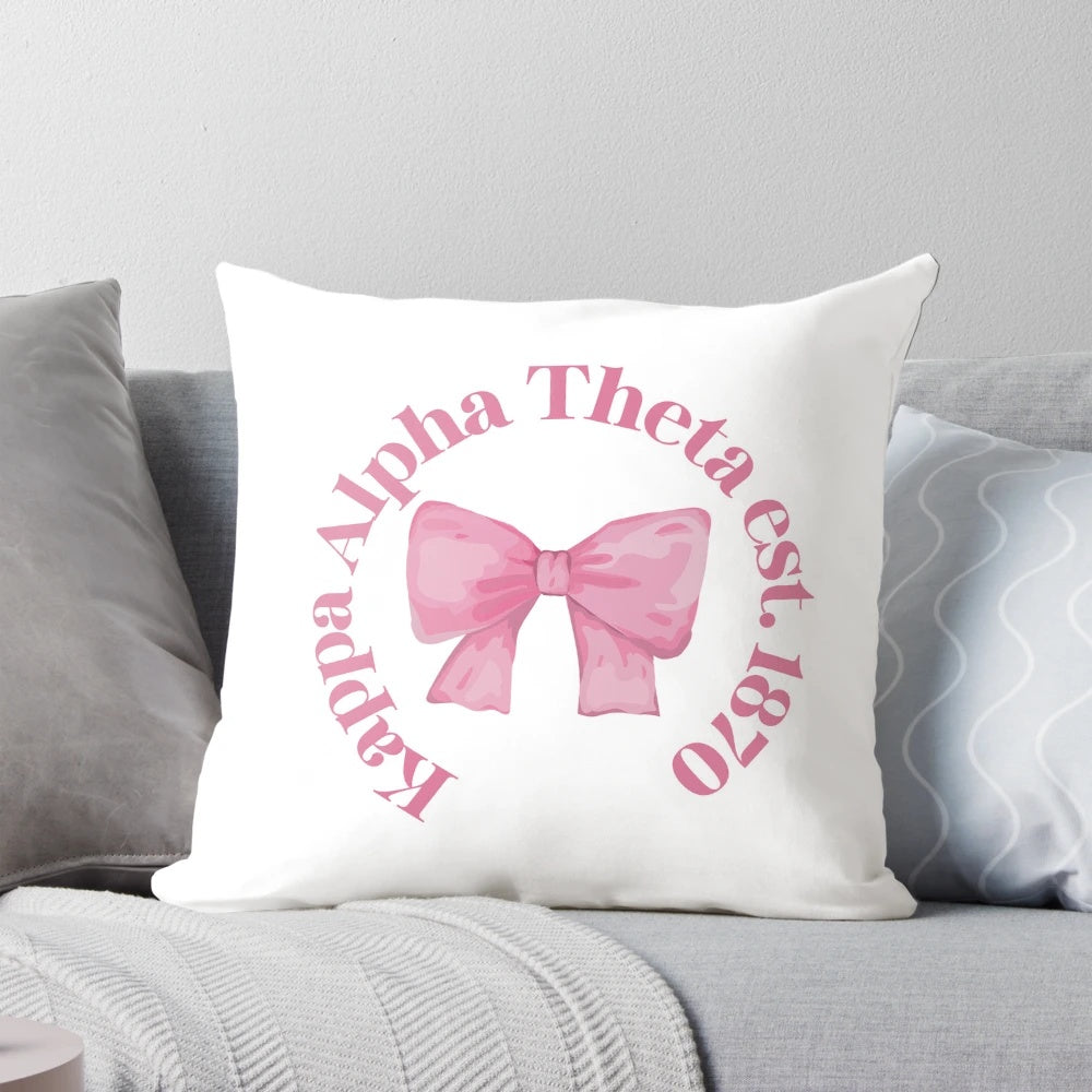 Kappa Alpha Theta sorority pillow with pink bow design