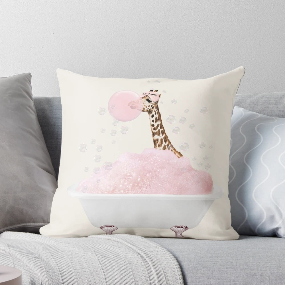 A pink foam pillow featuring a whimsical giraffe taking a bubble bath, perfect for nursery or bathroom decor.