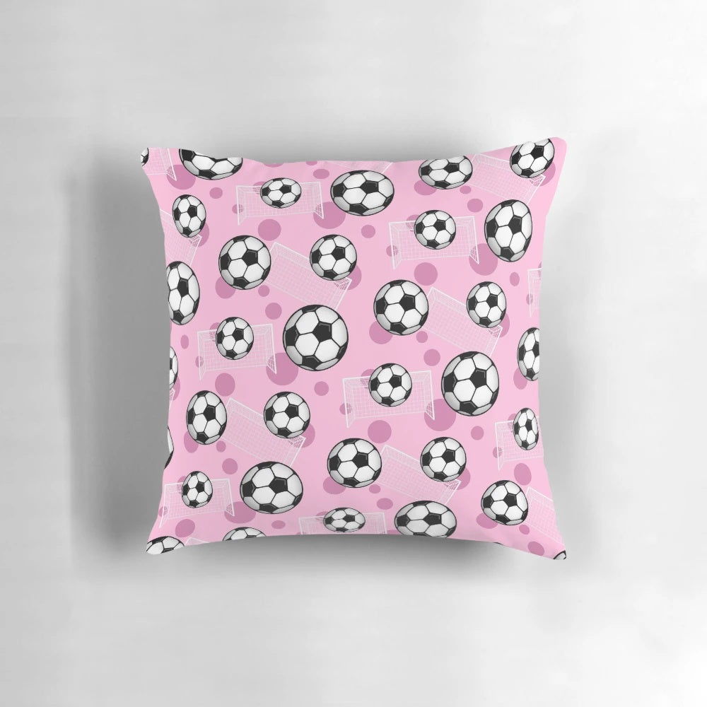 Pink Soccer Pillow featuring a vibrant pattern of soccer balls and goals