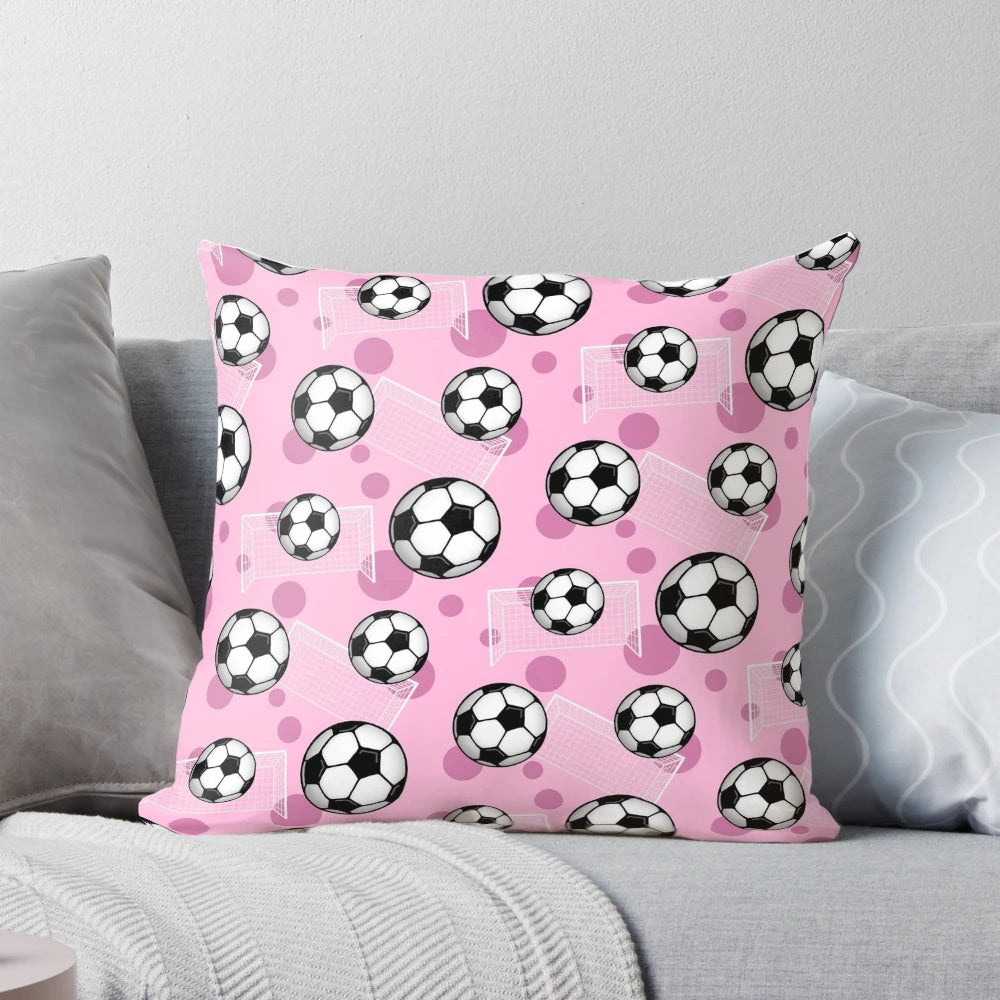 Pink Soccer Pillow featuring a vibrant pattern of soccer balls and goals