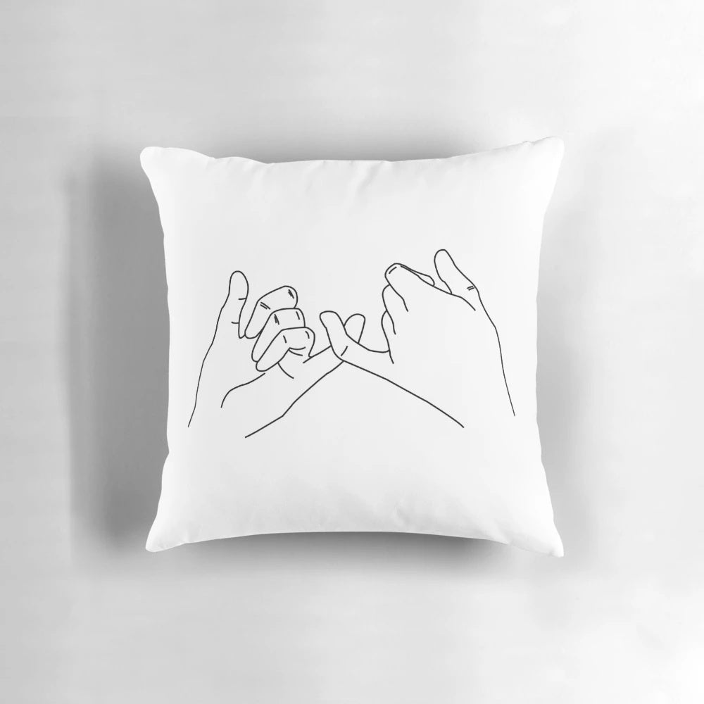 Pinky Promise Pillow with a simple, minimalist design of two hands forming a pinky promise.