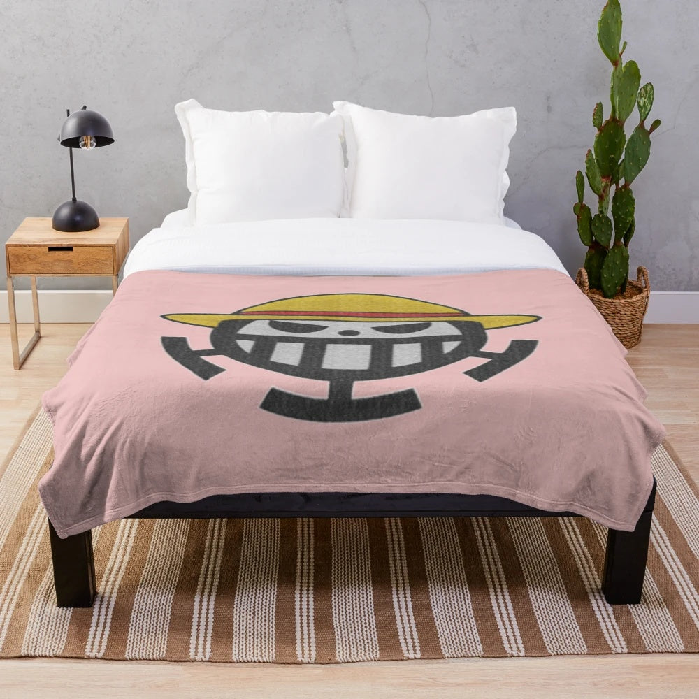 Pirate-themed plush blanket with embroidered design
