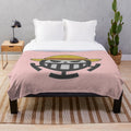 Pirate-themed plush blanket with embroidered design