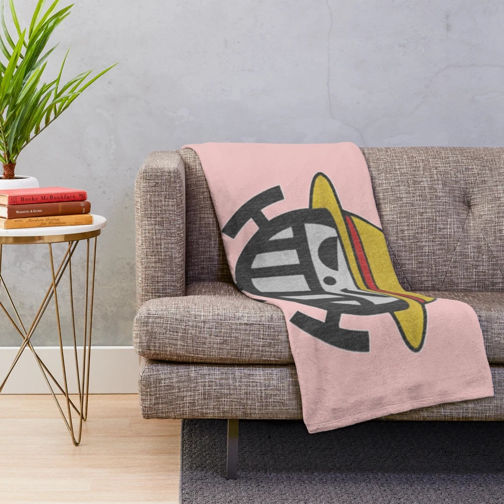Pirate-themed plush blanket with embroidered design