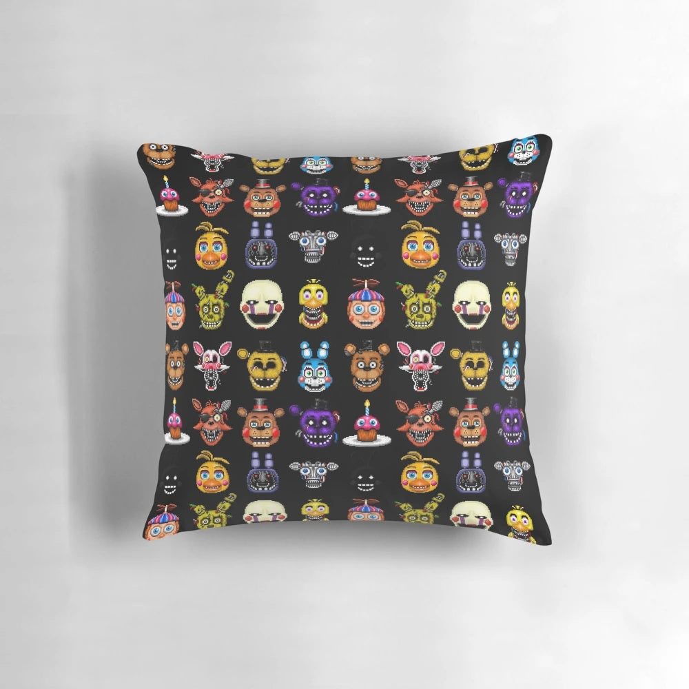 Pillow featuring pixel art designs of Five Nights at Freddy's characters