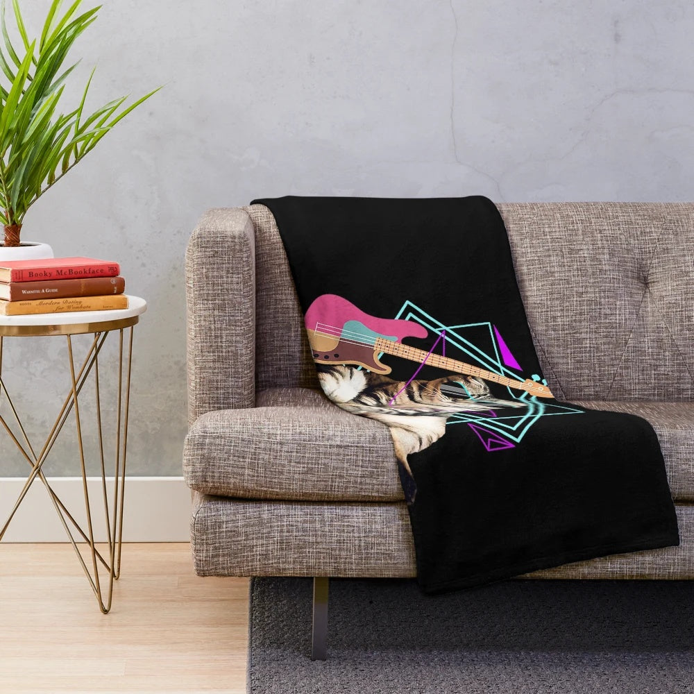A cute and playful cat sitting on a bass guitar, perfect for music lovers and cat fans
