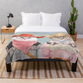 Colorful plush blanket featuring quirky cowboy cats in a maximalist art style