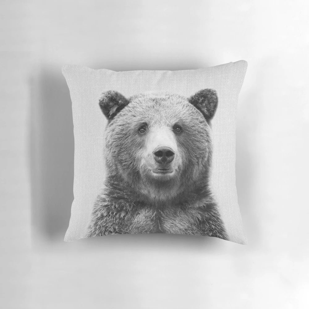 Monochrome portrait of a grizzly bear in a natural setting, perfect for a modern nursery or child's room.
