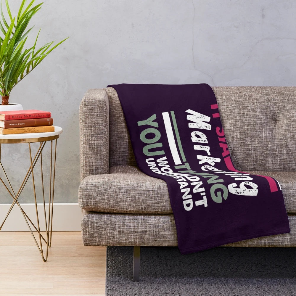 Plush blanket with "It's a Marketing Thing You Wouldn't Understand" text