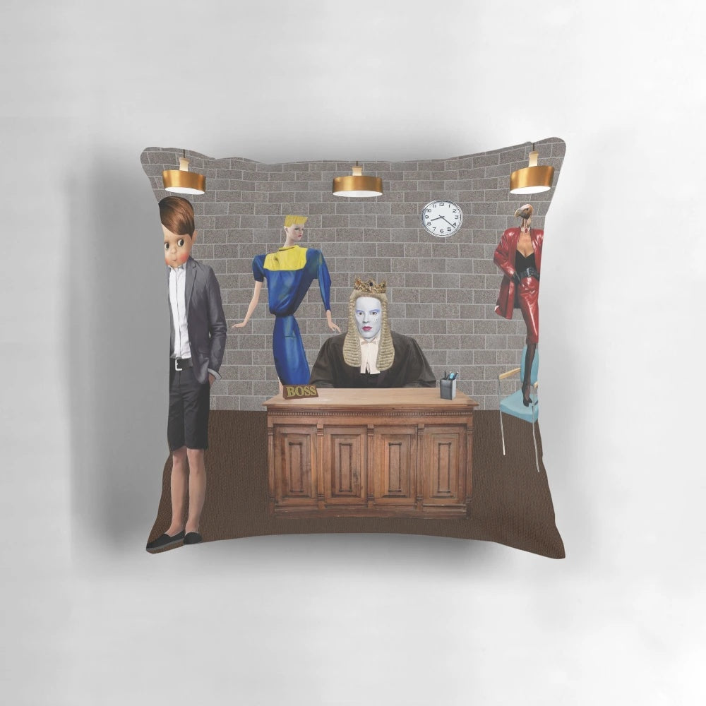A colorful, collage-style decorative pillow featuring humorous office-themed elements like a vulture, cat, and dog.