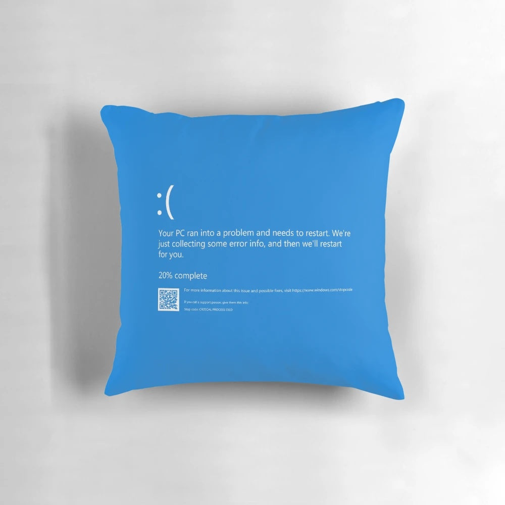 Colorful pillow depicting the Windows blue screen of death error