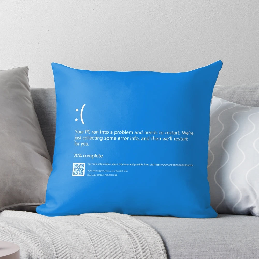 Colorful pillow depicting the Windows blue screen of death error