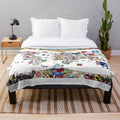 Plush blanket featuring a colorful world map with country ball illustrations