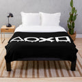 Playstation-inspired black and white plush blanket