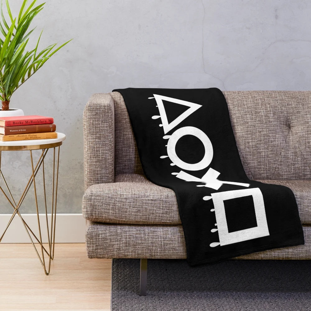 Playstation-inspired black and white plush blanket