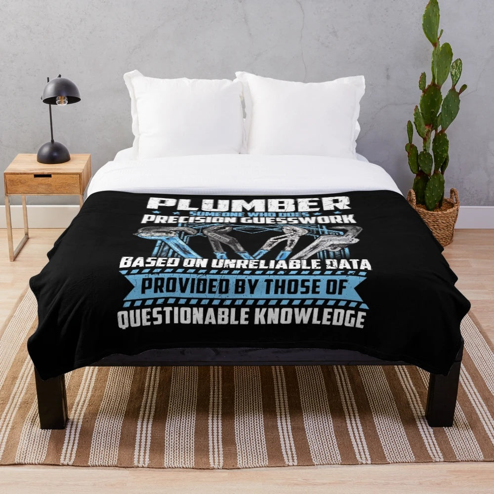 Plumbing plush blanket with sarcastic "precision guesswork" design
