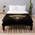 Soft and cozy plush blanket featuring the Austin Bruins logo and colors