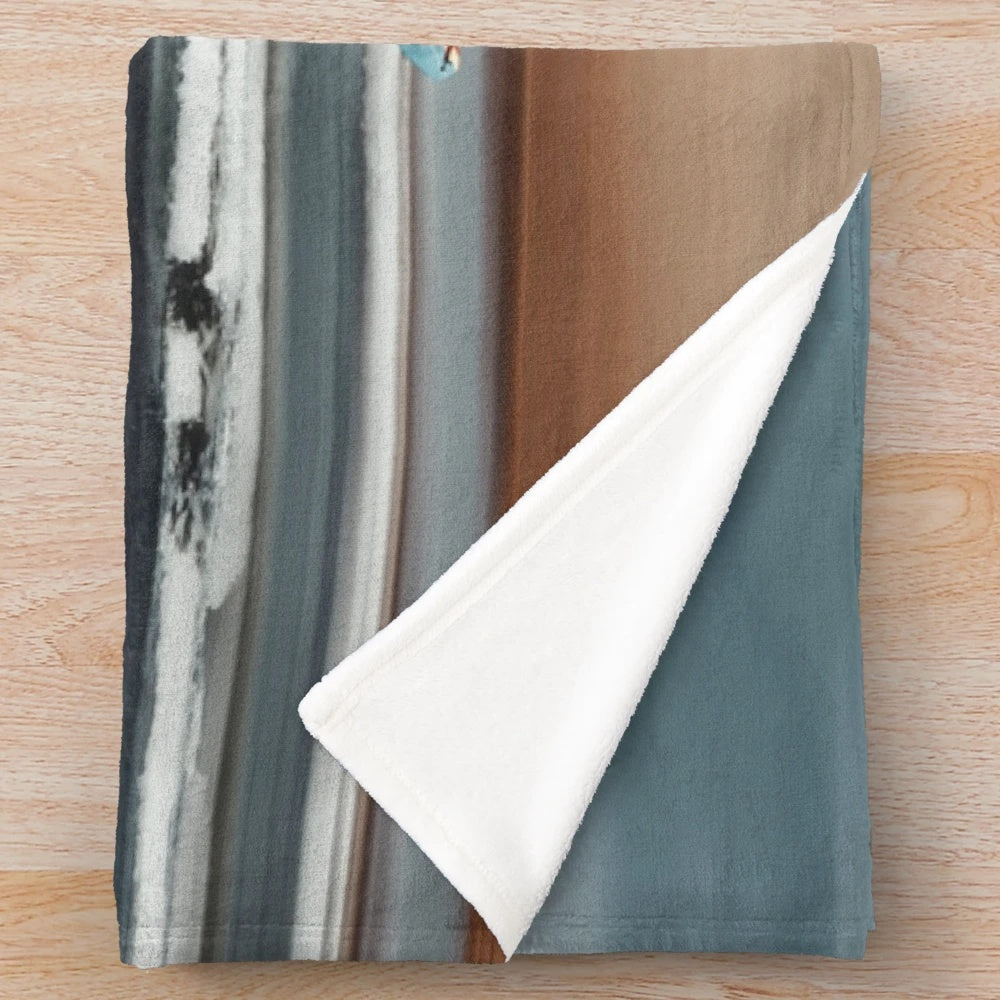 Plush blanket with abstract, motion blur surf art design