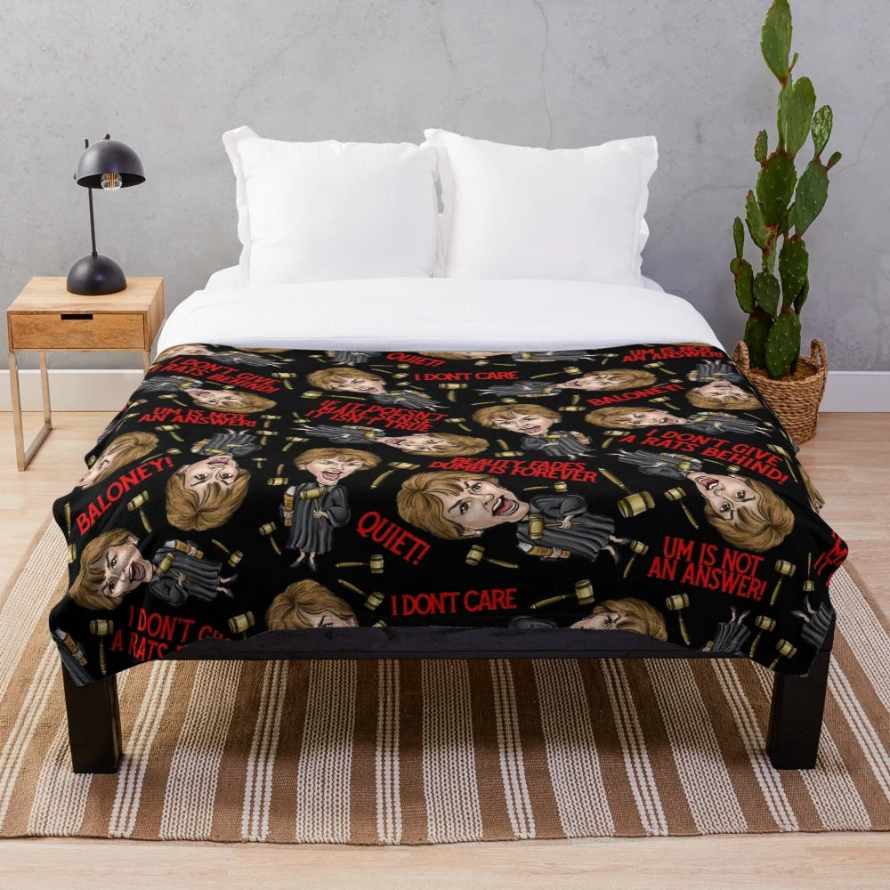Black plush blanket featuring a Judge Judy print design