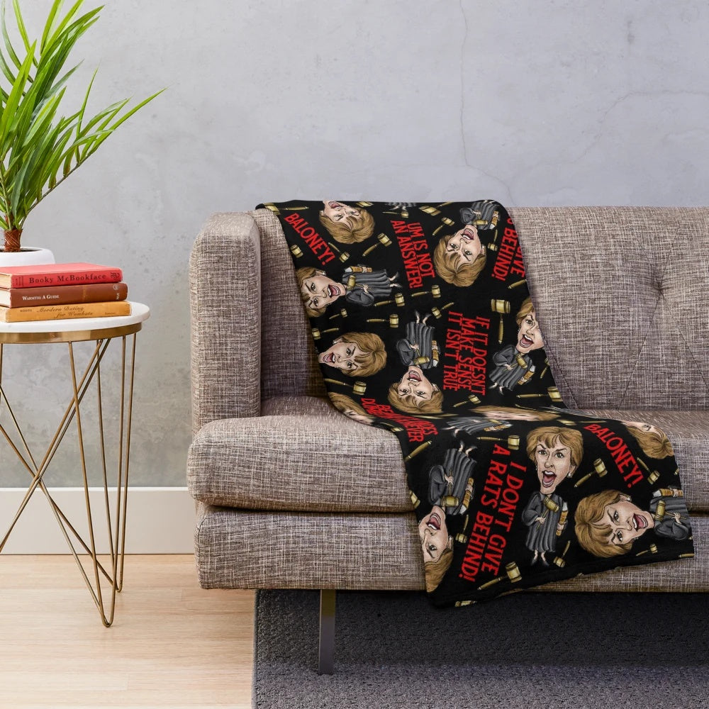 Black plush blanket featuring a Judge Judy print design