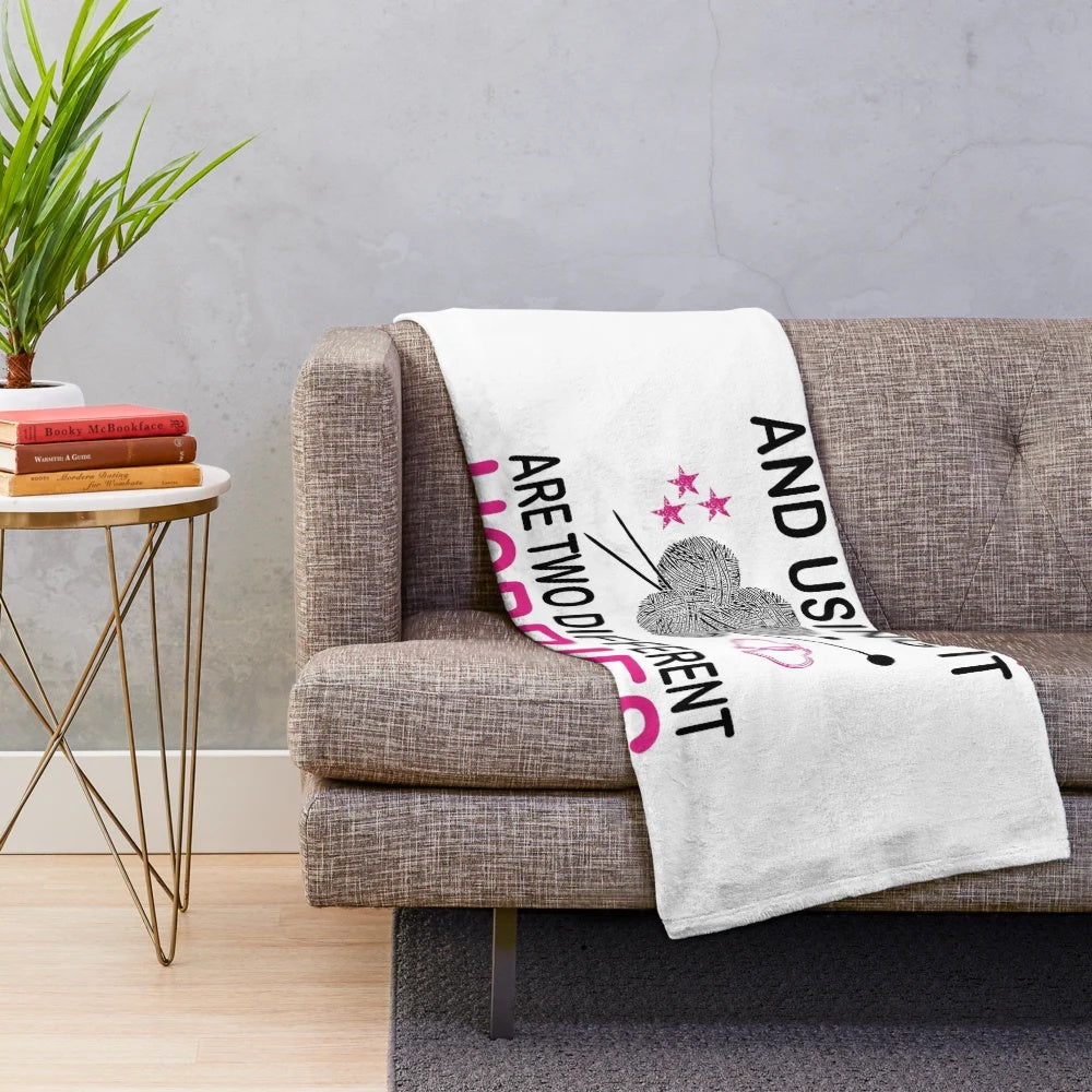 Plush blanket with text "Buying Yarn and Using It Are Two Different Hobbies" for knitting lovers