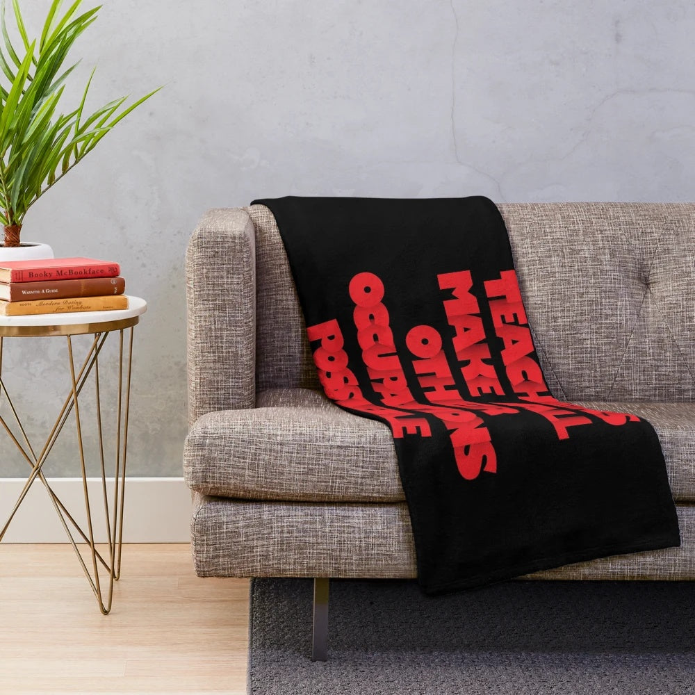Plush blanket with text "Teachers Make All Other Occupations Possible