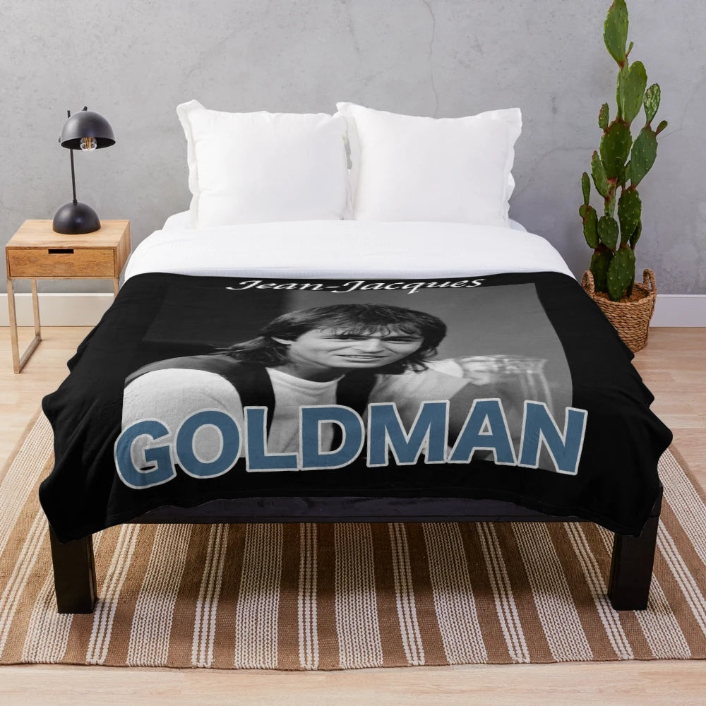 Plush blanket featuring the image of French singer Jean-Jacques Goldman