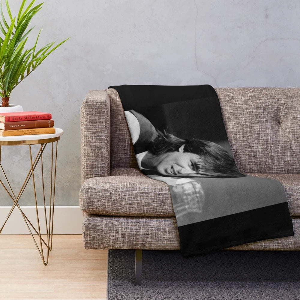 Plush blanket featuring the image of French singer Jean-Jacques Goldman