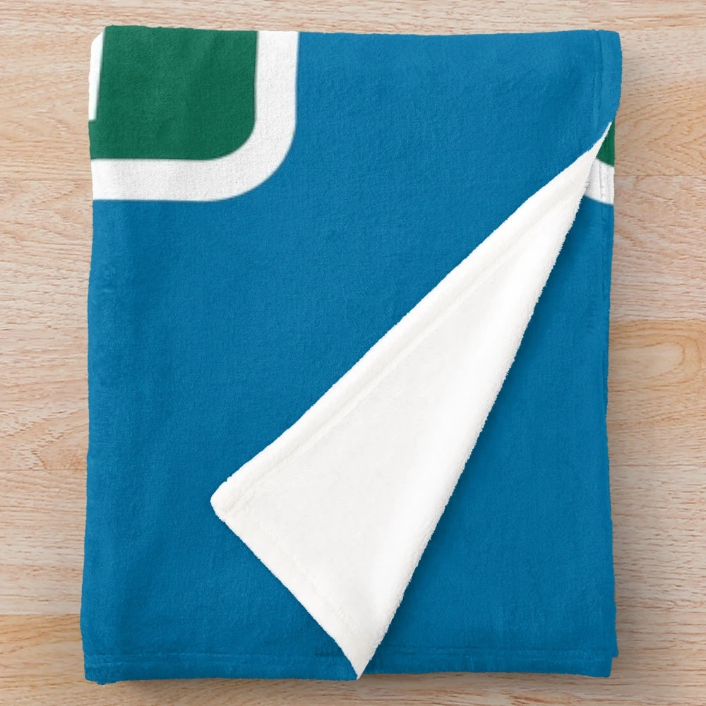 Plush blanket featuring the area code 605 and iconic South Dakota landmarks