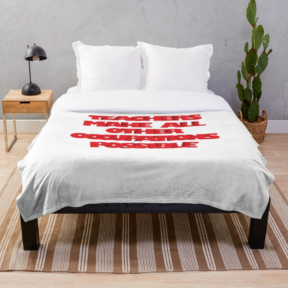 Plush blanket featuring the text "Teachers Make All Other Occupations Possible
