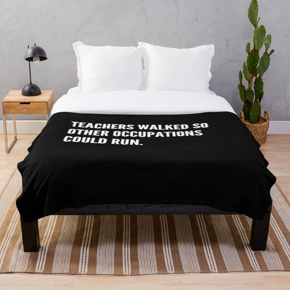 Plush blanket with the text "Teachers Walked So Other Occupations Could Run