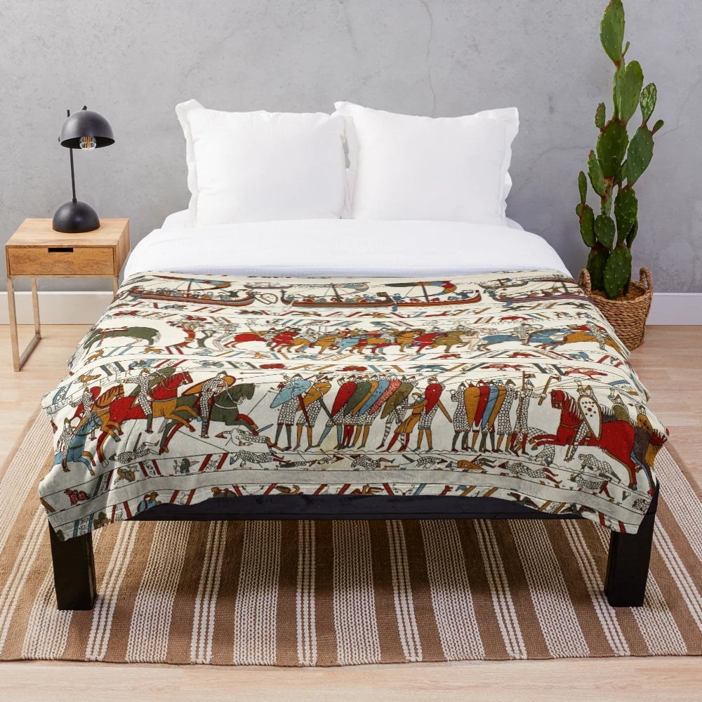 Plush blanket featuring medieval battle scenes from the Bayeux Tapestry