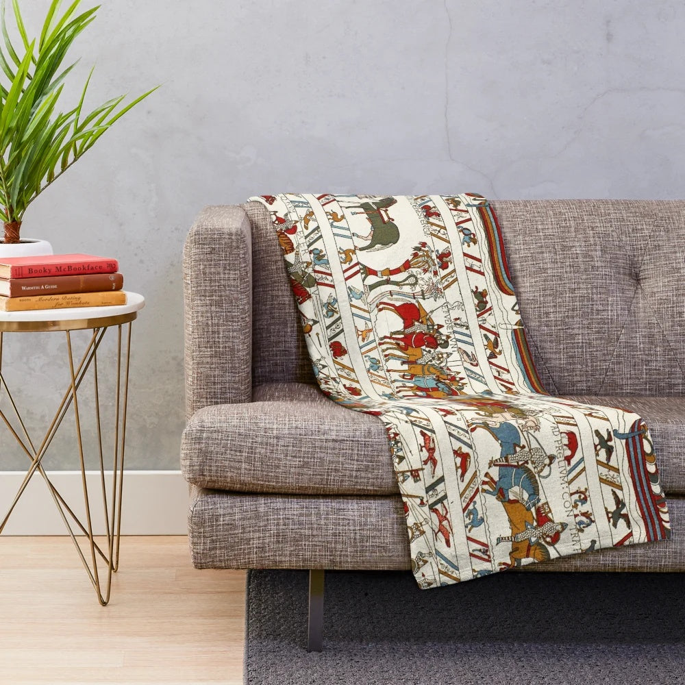 Plush blanket featuring medieval battle scenes from the Bayeux Tapestry