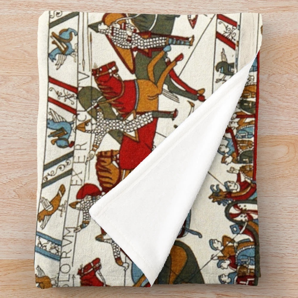 Plush blanket featuring medieval battle scenes from the Bayeux Tapestry