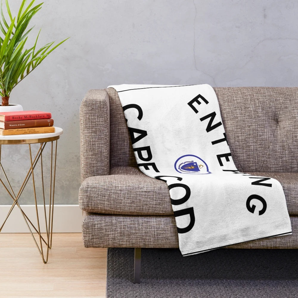 Plush blanket with a Cape Cod-inspired road sign design