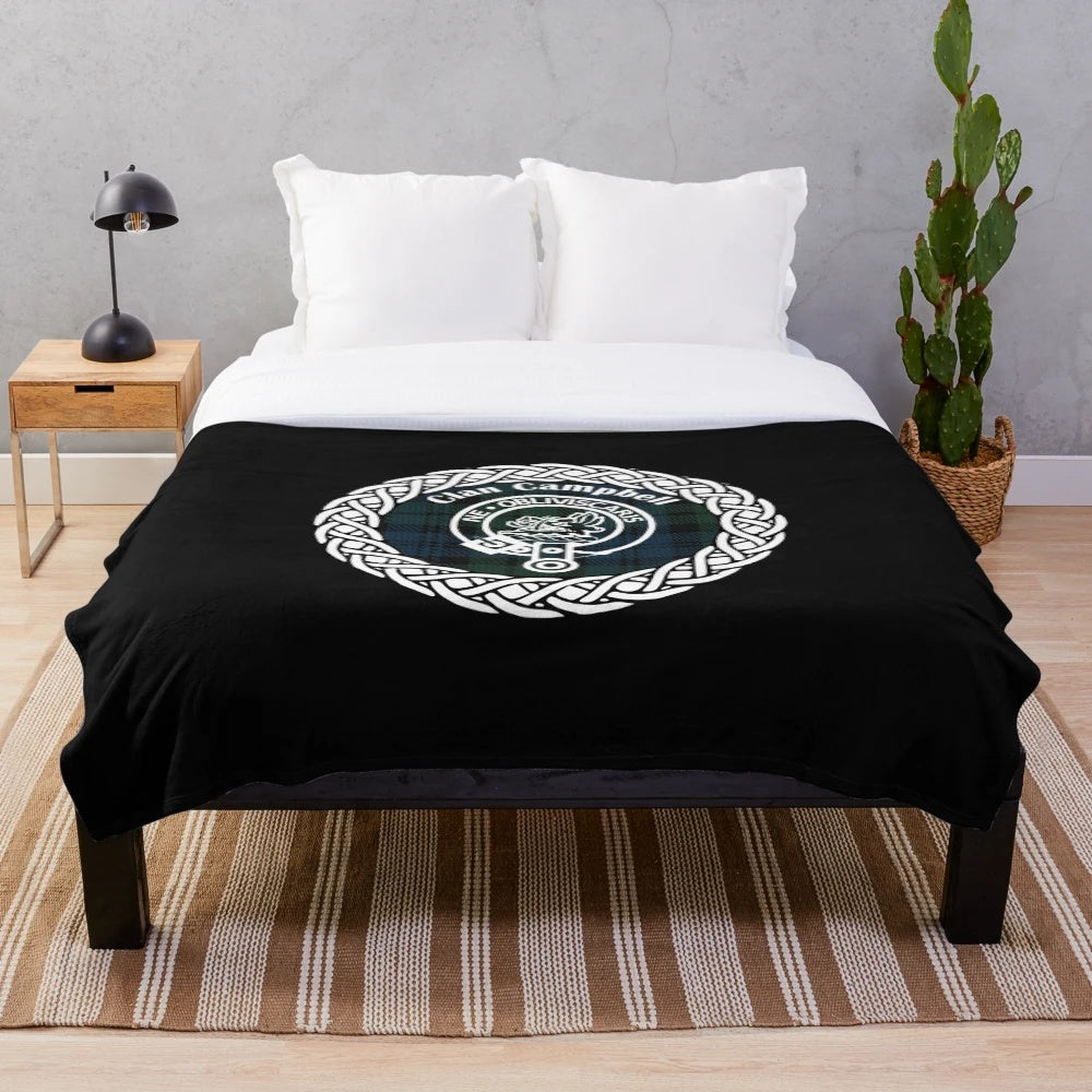 Plush blanket showcasing the Campbell tartan and crest design