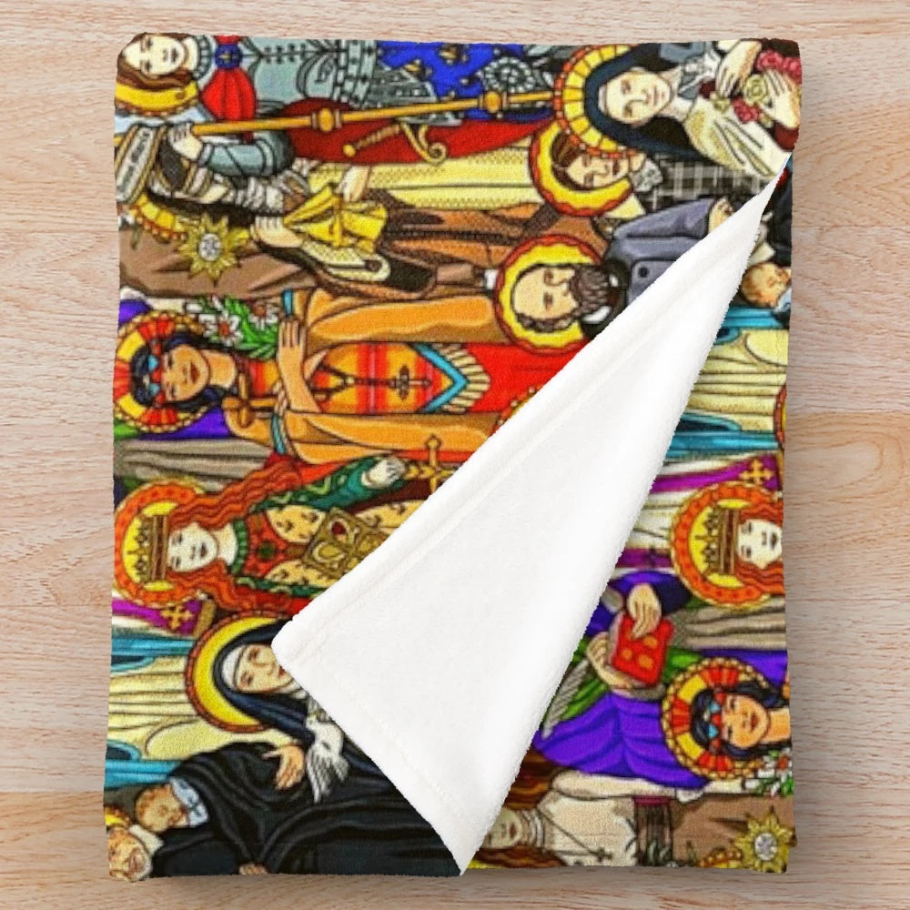 Plush blanket with images of Catholic saints, Jesus Christ, and religious symbols