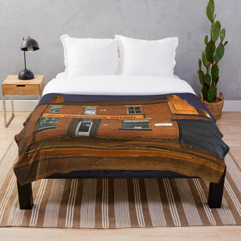 Plush blanket showcasing the historic Henderson's Relish building in Sheffield, Yorkshire