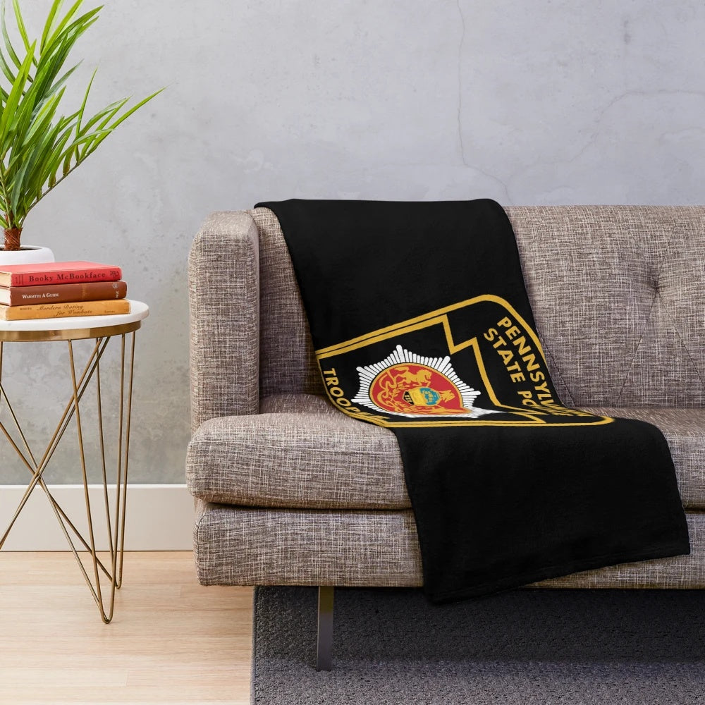Plush blanket with Pennsylvania State Police logo design