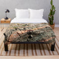 Plush blanket with print of geological formation of tilted banded rocks from the Rosemarkie Metamorphic Complex in the Scottish Highlands