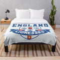 Plush blanket with the England Lionesses football shield design