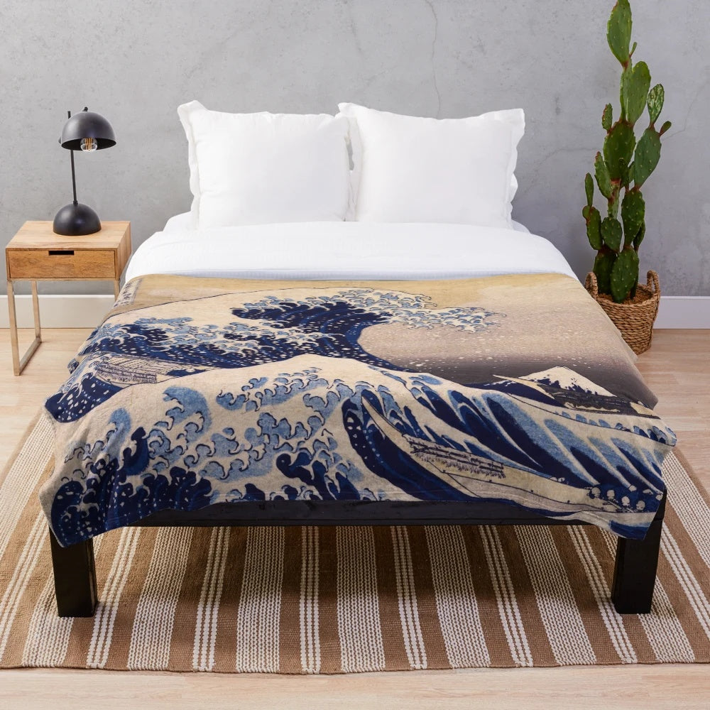 Plush blanket with the famous "The Great Wave off Kanagawa" painting by Japanese artist Katsushika Hokusai