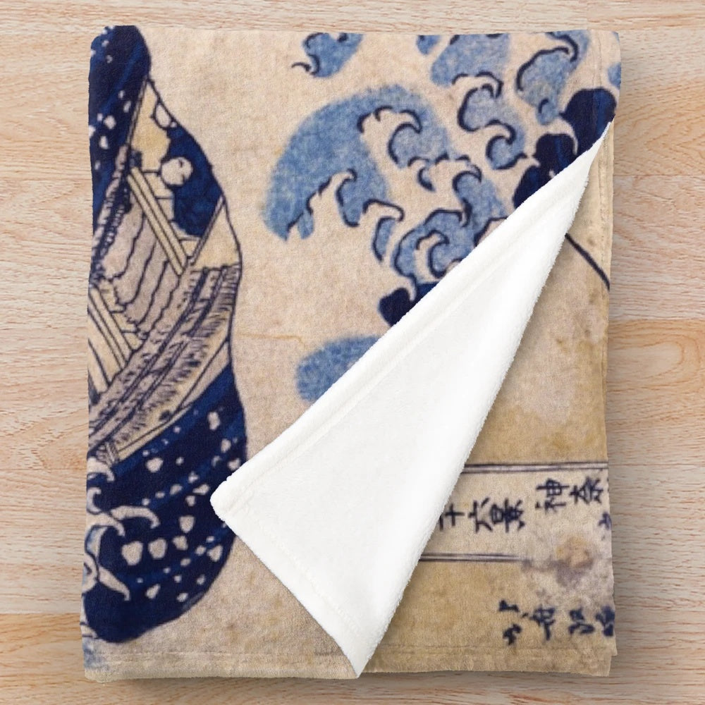 Plush blanket with the famous "The Great Wave off Kanagawa" painting by Japanese artist Katsushika Hokusai