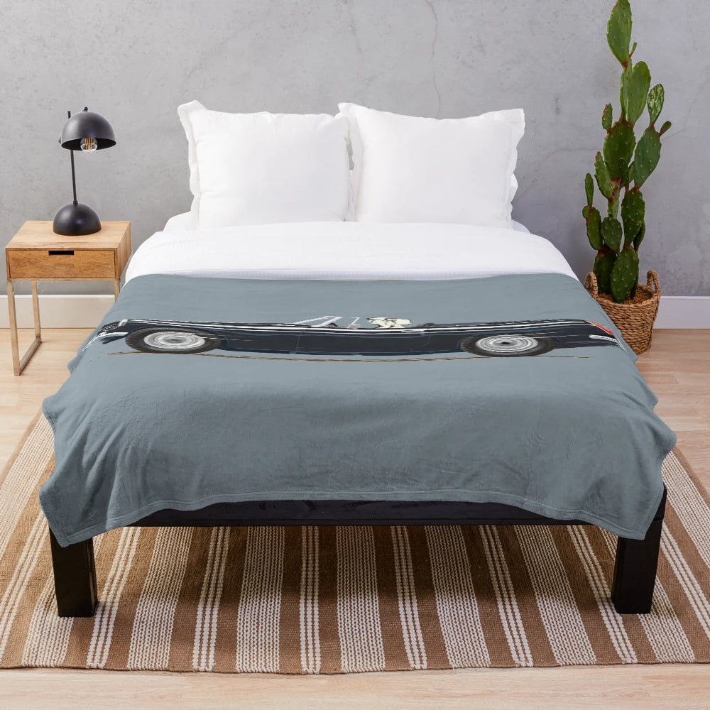 Plush blanket featuring the iconic MGB sports car