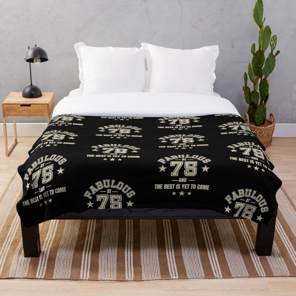 Plush blanket with "Fabulous at 75" and "The Best is Yet to Come" design for 75th birthday