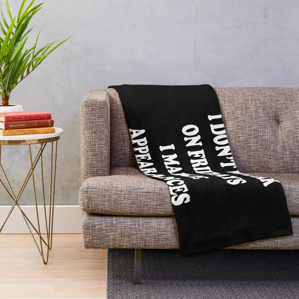 Plush blanket with "I don't work on Fridays" text, ideal for office and career-focused humor