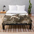 Plush blanket with bull rider, rodeo quotes, and rough stock riders design